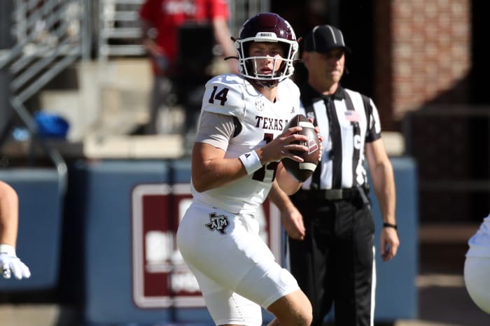 Nov 4, 2023; Oxford, Mississippi, USA; Texas A&M Aggies quarterback Max Johnson (14) passes the ball against the Mississippi Rebels during the first half at Vaught-Hemingway Stadium.